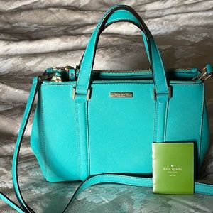Kate Spade satchel bag in bluish green.